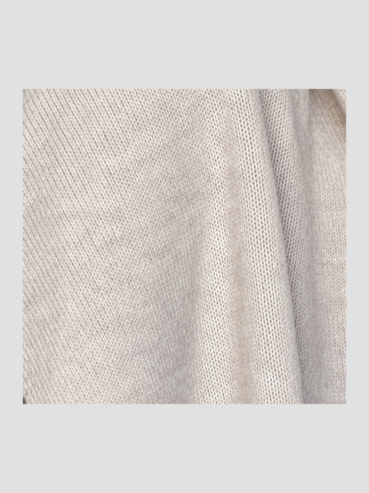 Close-up of the Dom Goor Oyster Donegal Merino wool scarf knit texture