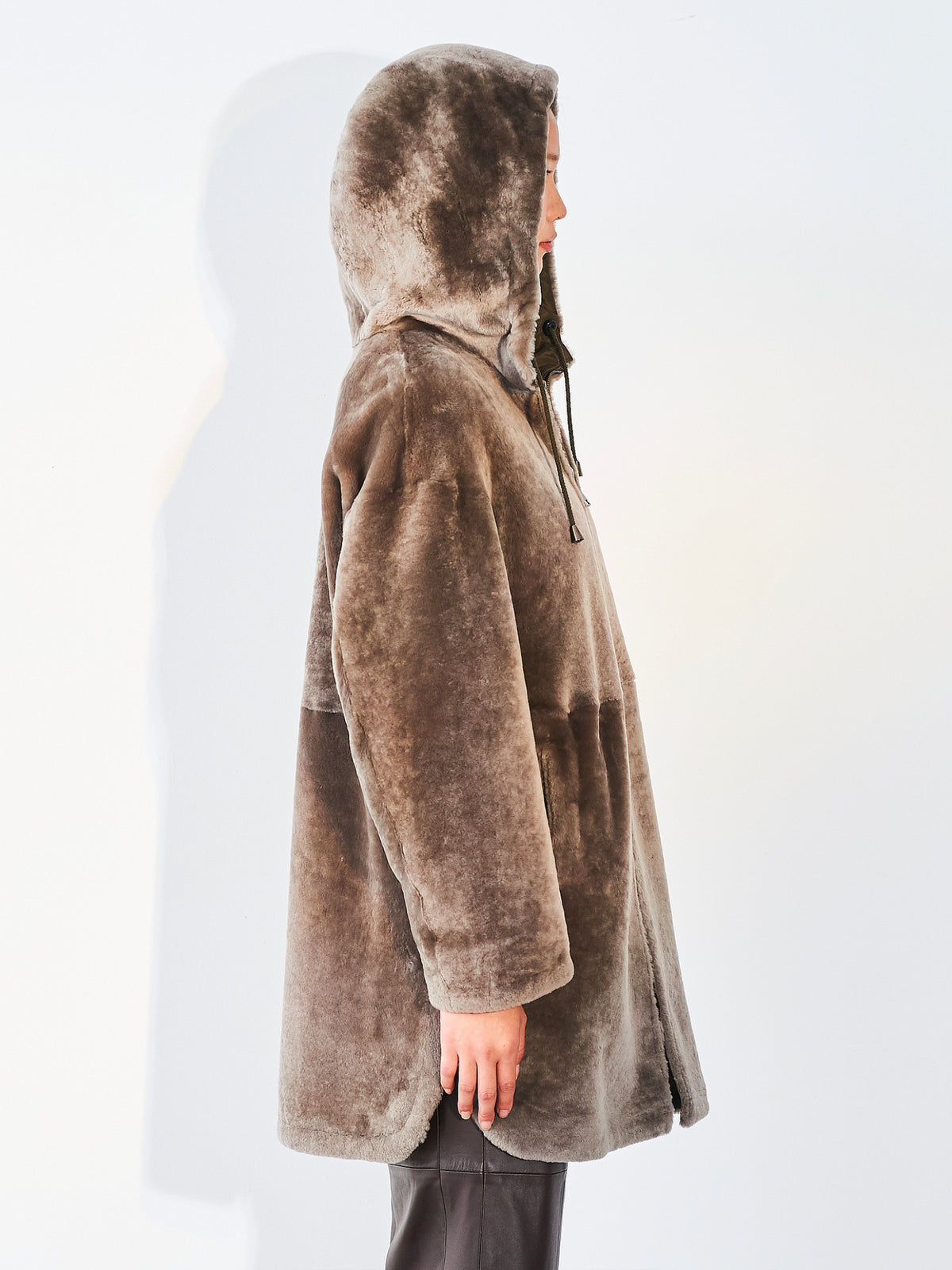 Side view of the Dom Goor taupe shearling Tec Hooded Parka with the hood up
